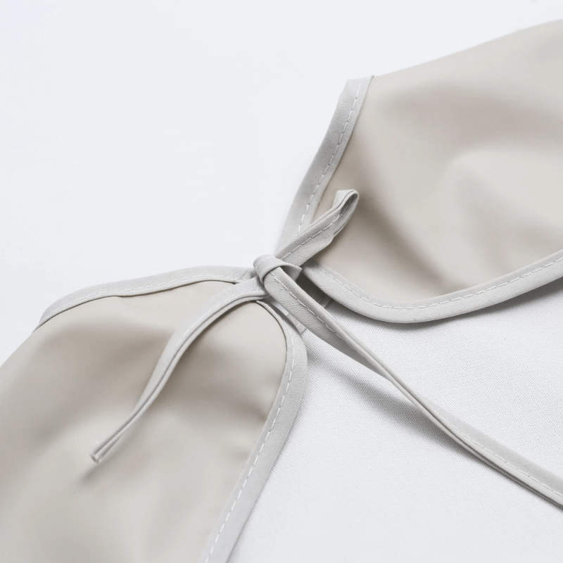 Πλαστικοποιημένη Σαλιάρα με Μανίκια - Εκρού - Trois Kilos Sept